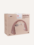 The Done by Deer Activity Gym is a blue arch with attached plush toys, perfect for floor time. The hanging toys include an elephant, a dome-shaped toy with geometric patterns, and a striped animal. Ideal for stimulating your baby’s senses, the arch stands freely with wide triangular supports at both ends.