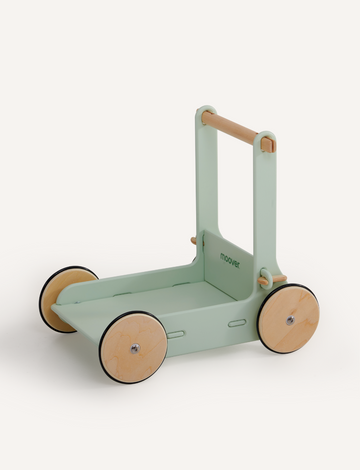 The Moover Toys Classic Baby Walker, in light green, is a perfect wooden mobility toy for a child's development. Featuring four natural wood wheels and a sturdy handle, its elegant brand name enhances its simple design, promising both fun and growth for your little one.