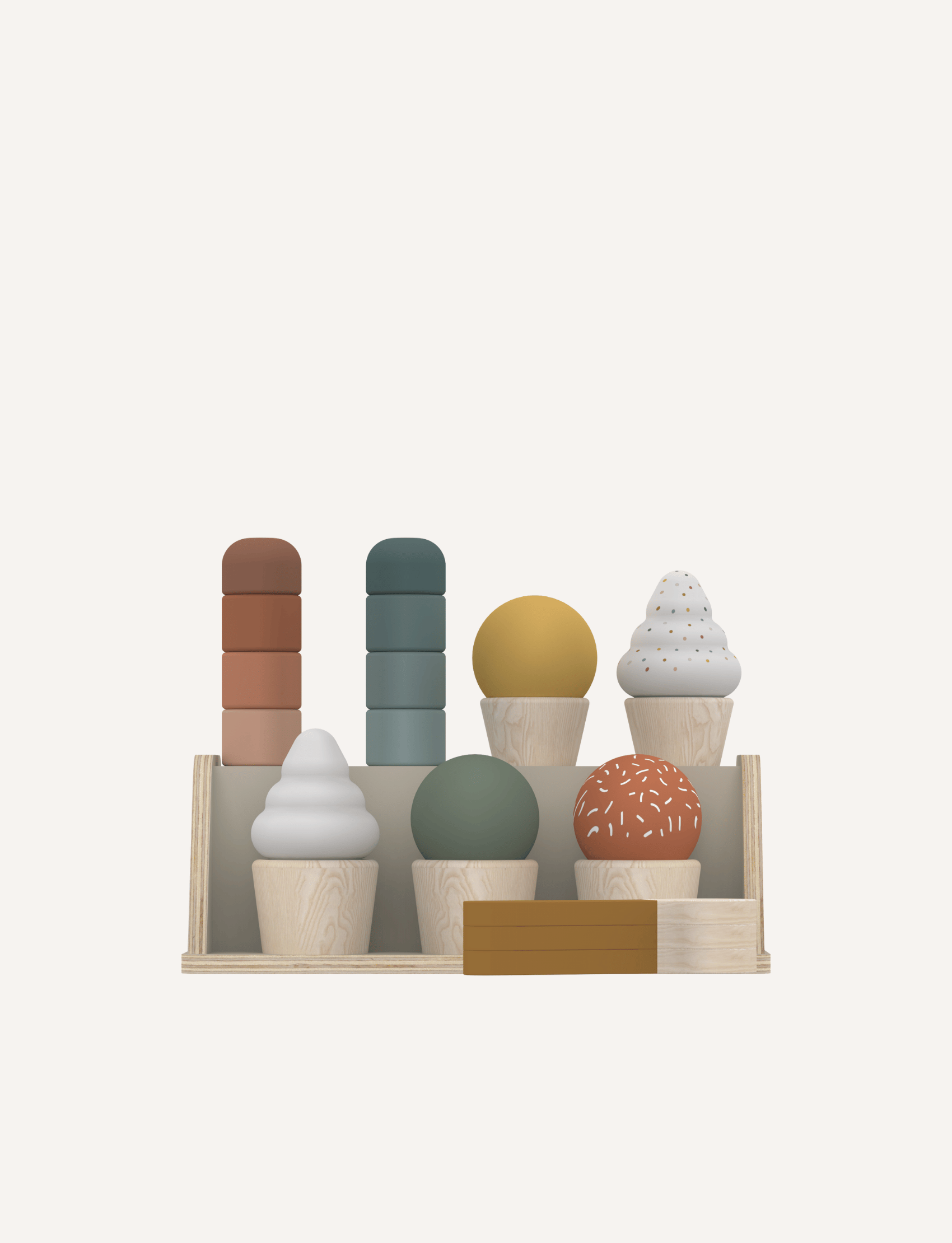 A young girl with long hair, wearing a headband and a light-colored sweater, is thoroughly enjoying her Flexa Ice Cream Set. The eco-friendly set includes various colorful, wooden ice cream cones arranged on a white shelf, fostering imaginative play as she reaches for one with delight.