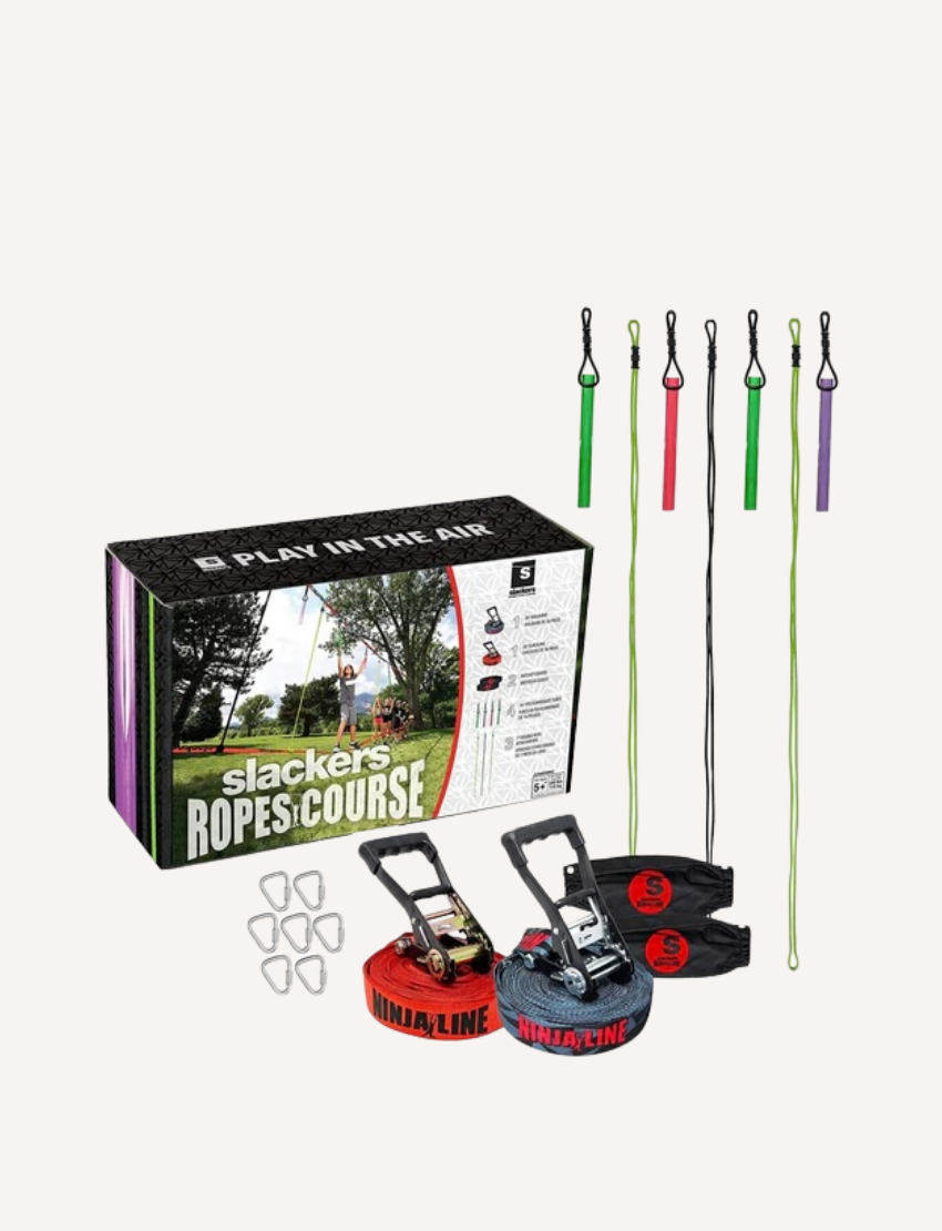 The image shows a rectangular box for a product called "Ropes Course" by Slackers. The box features an image of a person using the ropes course in an outdoor park setting. The sides of the box include product details and specifications.