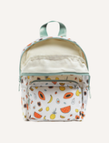 The IZIMINI Mini Backpack, featuring a cream-colored base adorned with a playful fruit pattern—including avocados, bananas, pineapples, and watermelons—is perfect for your toddler. It boasts mint-green straps and zipper pulls, a small exterior pocket, and plenty of space for little essentials.