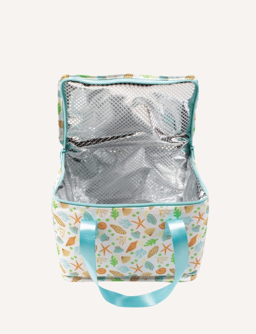 The IZIMINI Sailor Lunch Bag is a rectangular insulated lunch bag featuring a white background adorned with a colorful seashell pattern. It boasts a turquoise zipper and matching handles, and has a structured shape that stands upright.