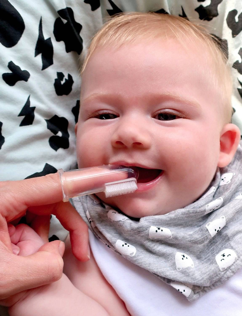 Here is a rewritten version of the sentence using the given product data:

The Silicone Finger Brush - Stage 1 by Jack N' Jill comes in a package designed for infants aged 6-12 months. The package includes two brushes and a case, and it is made of environmentally-friendly brown material with a transparent window.