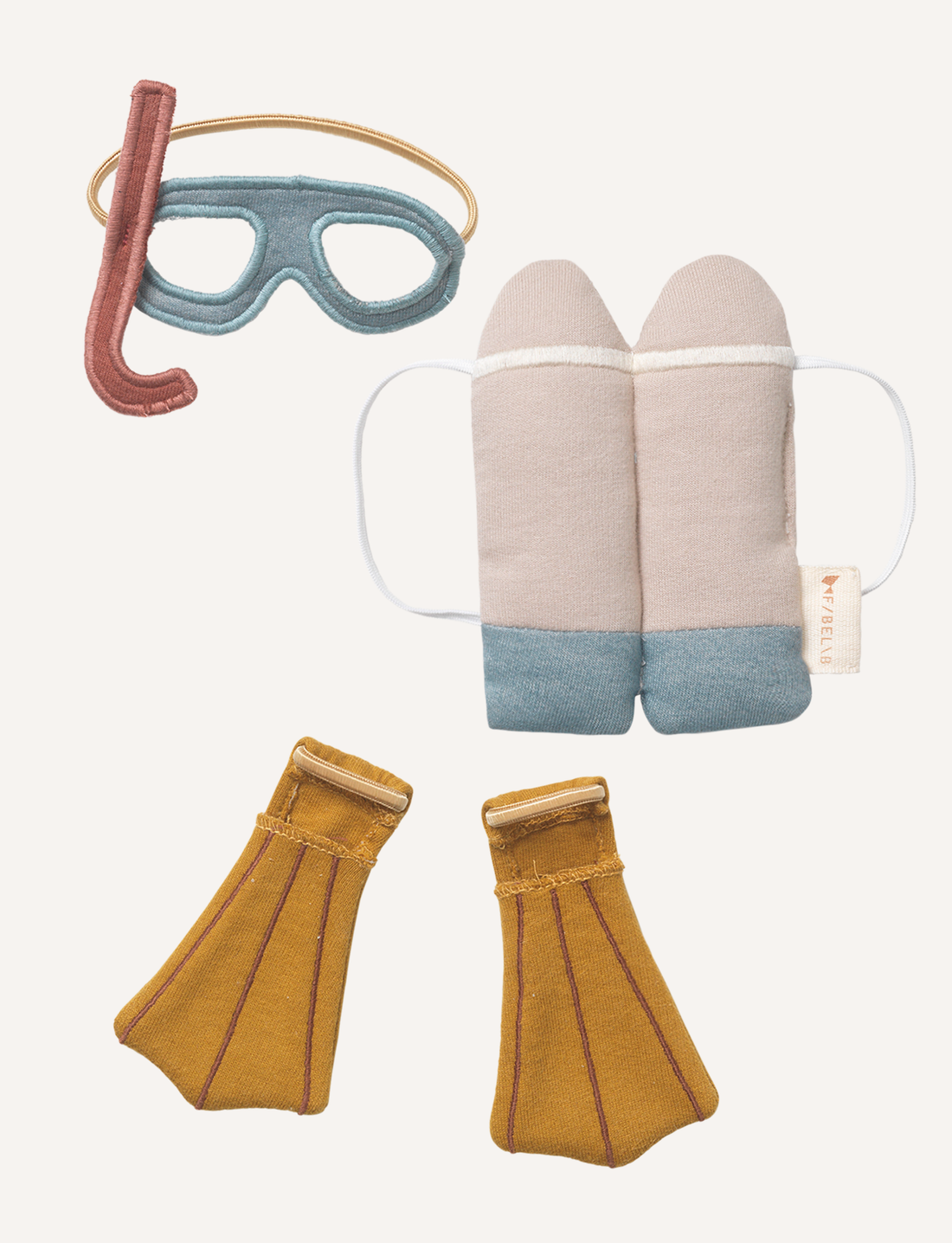 The Fabelab Doll Clothes - Scuba Set includes a soft fabric diving mask with snorkel, a pair of beige and blue flippers, and a beige and blue scuba tank with straps. All items are crafted from fabric and designed as toy replicas of real scuba gear, providing eco-friendly fun for little adventurers.