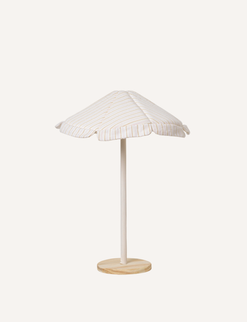 The Fabelab Doll Accessories - Parasol is a charming small round umbrella featuring a white and beige striped canopy. It is secured on a single pale wooden pole with a circular wooden base, making it perfect as a decorative piece or for adding sun protection to your dolls in your summer doll accessories collection.