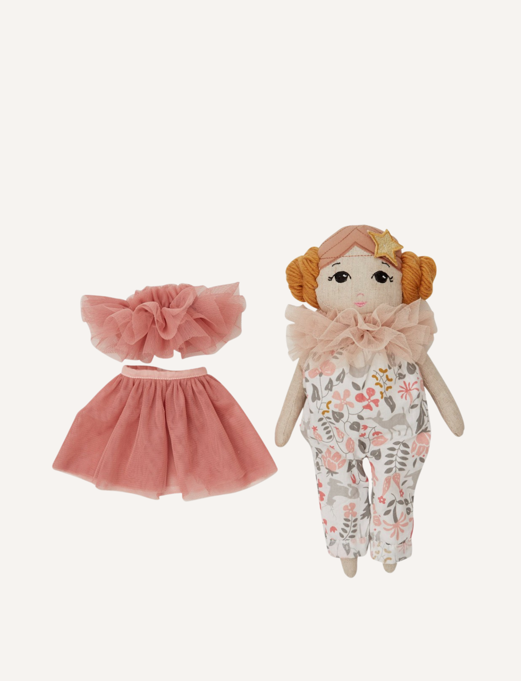 Doll Estelle, from the brand by Astrup, is a luxurious fabric doll with red hair. She is dressed in a floral outfit accented with a pink ruffled collar and comes placed next to a detachable pink tulle tutu and matching headband against a plain background. Perfect for imaginative play.