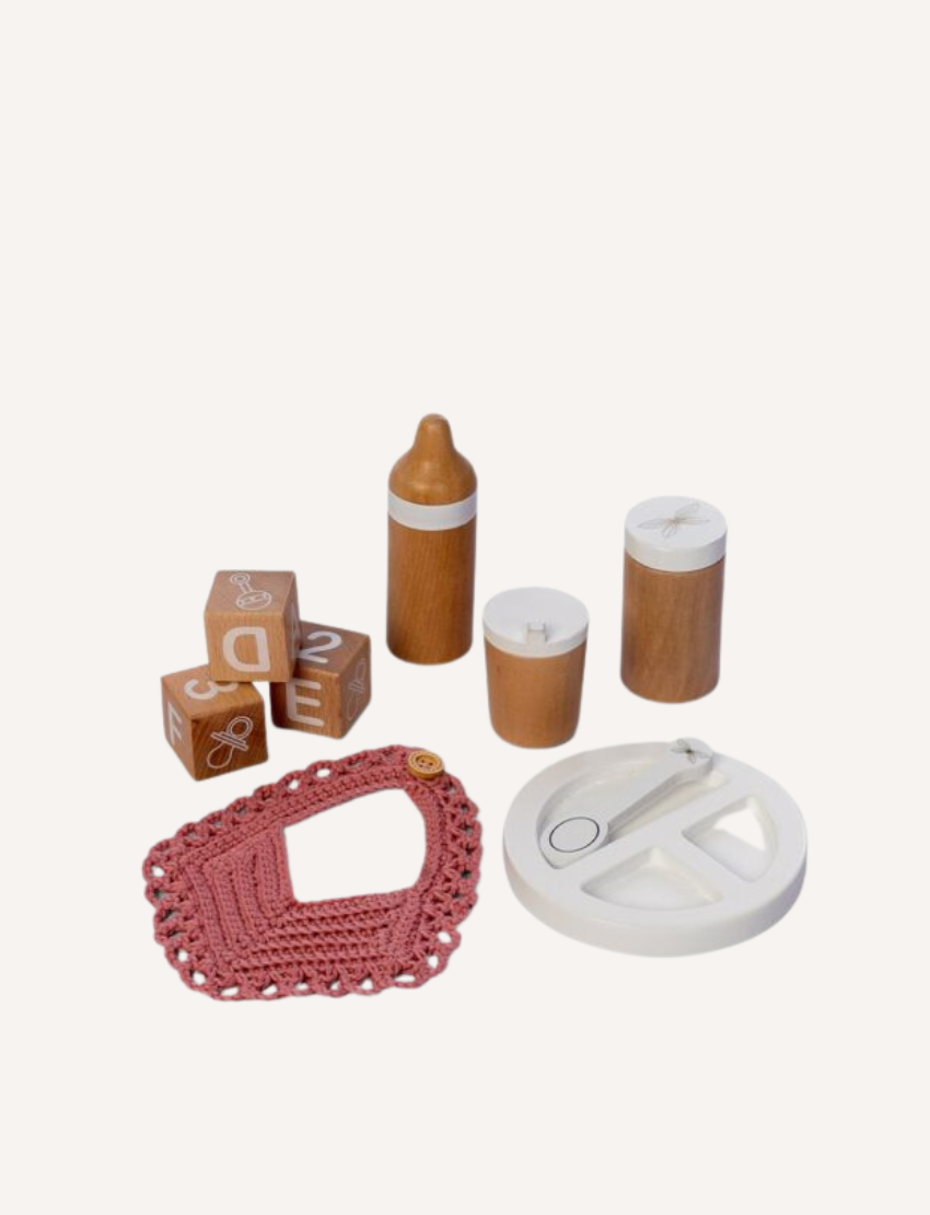 Wooden doll feeding role-play set with blocks, bottle, cups, bib, and feeding plate.