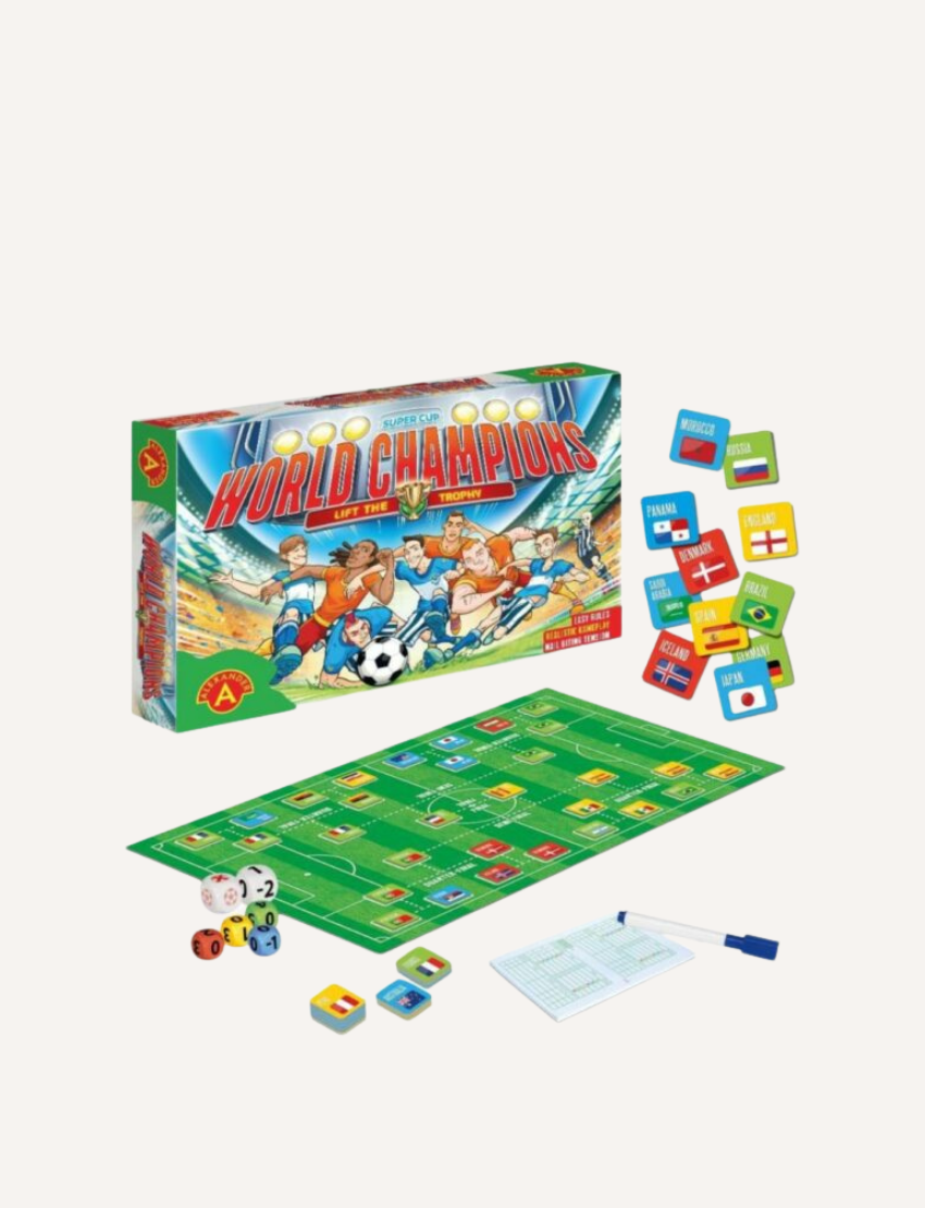 Image of a board game titled "World Champions Football" by Alexander Toys. The set includes a game board designed like a soccer field, colorful dice, score sheets, a pen, and cards featuring different country flags. The game box displays an illustration of soccer players in action.