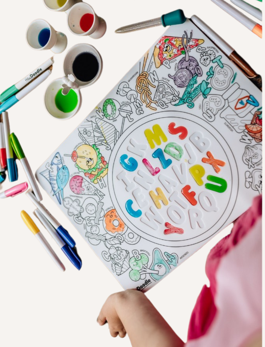 The HeyDoodle Sensory Mat by HeyDoodle provides an engaging coloring experience with black and white insects, perfect for enhancing sensory play and fine motor skills. It comes with vibrant markers to boost interactive learning.