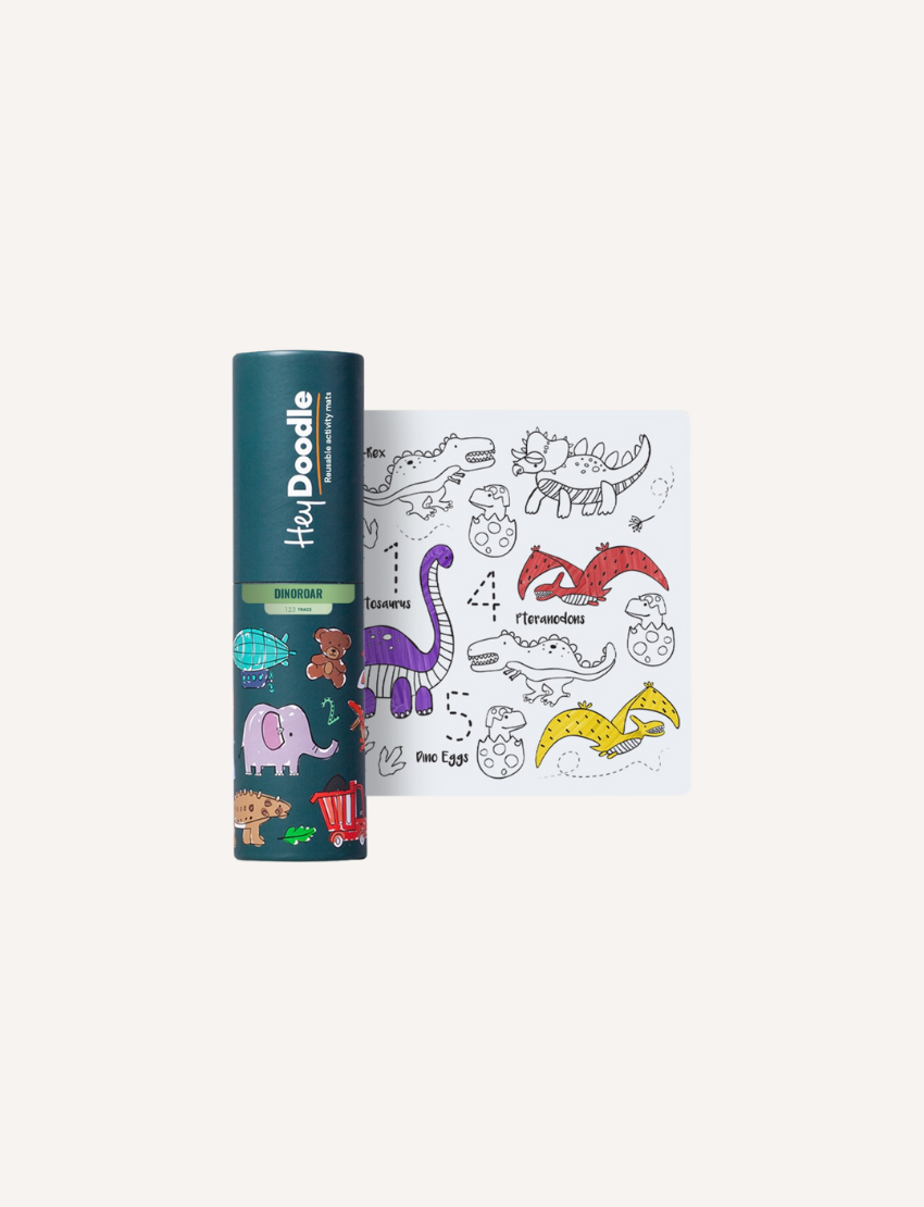 A HeyDoodle Mini Mat tube featuring dinosaur-themed illustrations along with a sheet that includes outlined drawings of dinosaurs, eggs, and plants in both black and white and color.