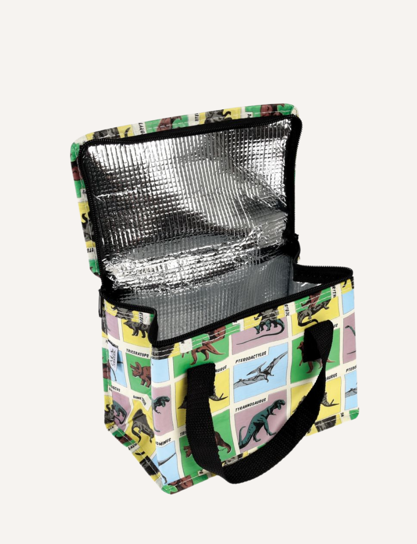 The Rex London Insulated Lunch Bag by Rex London showcases an open lid, revealing a reflective interior. It features a dark background adorned with vibrant rocket and spaceship illustrations, complemented by red zippers and handles.