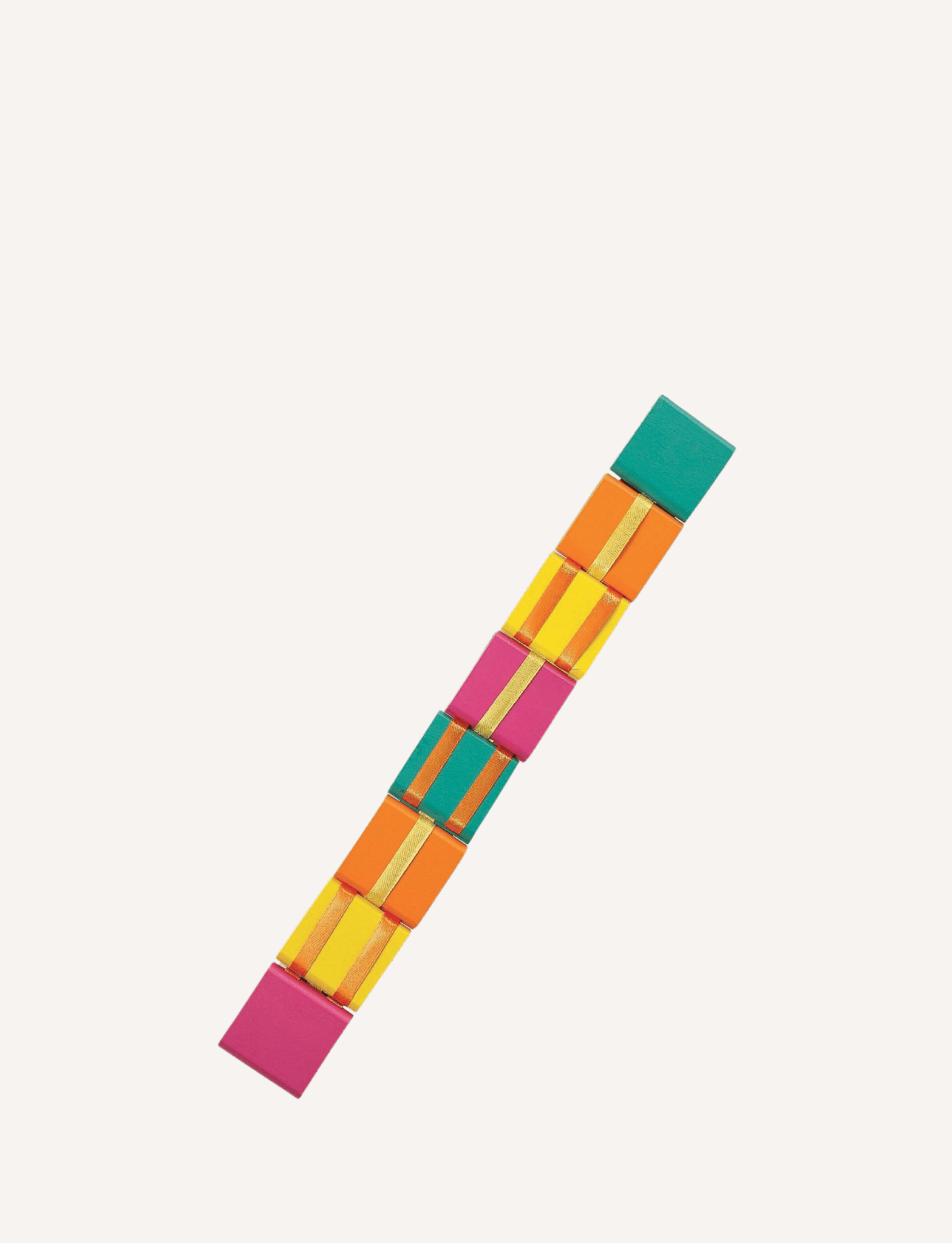 A hand holding a vibrant Sensory Genius "Jacobs Ladder" made up of connected rectangular blocks in orange, green, yellow, and pink. The blocks are arranged in a cascading manner, forming a flexible chain. This mesmerizing fidget toy stands out against the plain white background.