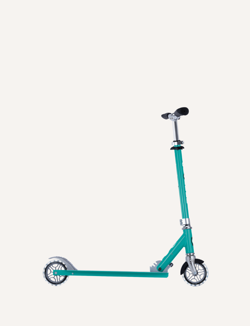 The Globber Flow Element Scooter with Lights is a black kick scooter featuring LED light-up wheels, a silver adjustable handlebar, and a foldable frame, all set against a plain white background.