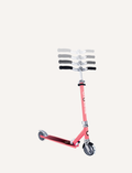 The Flow Element Scooter with Lights by Globber, featuring a sleek black and silver design, is shown. It has handlebars with black grips, a stand, and a rear brake. The scooter is positioned against a white background.