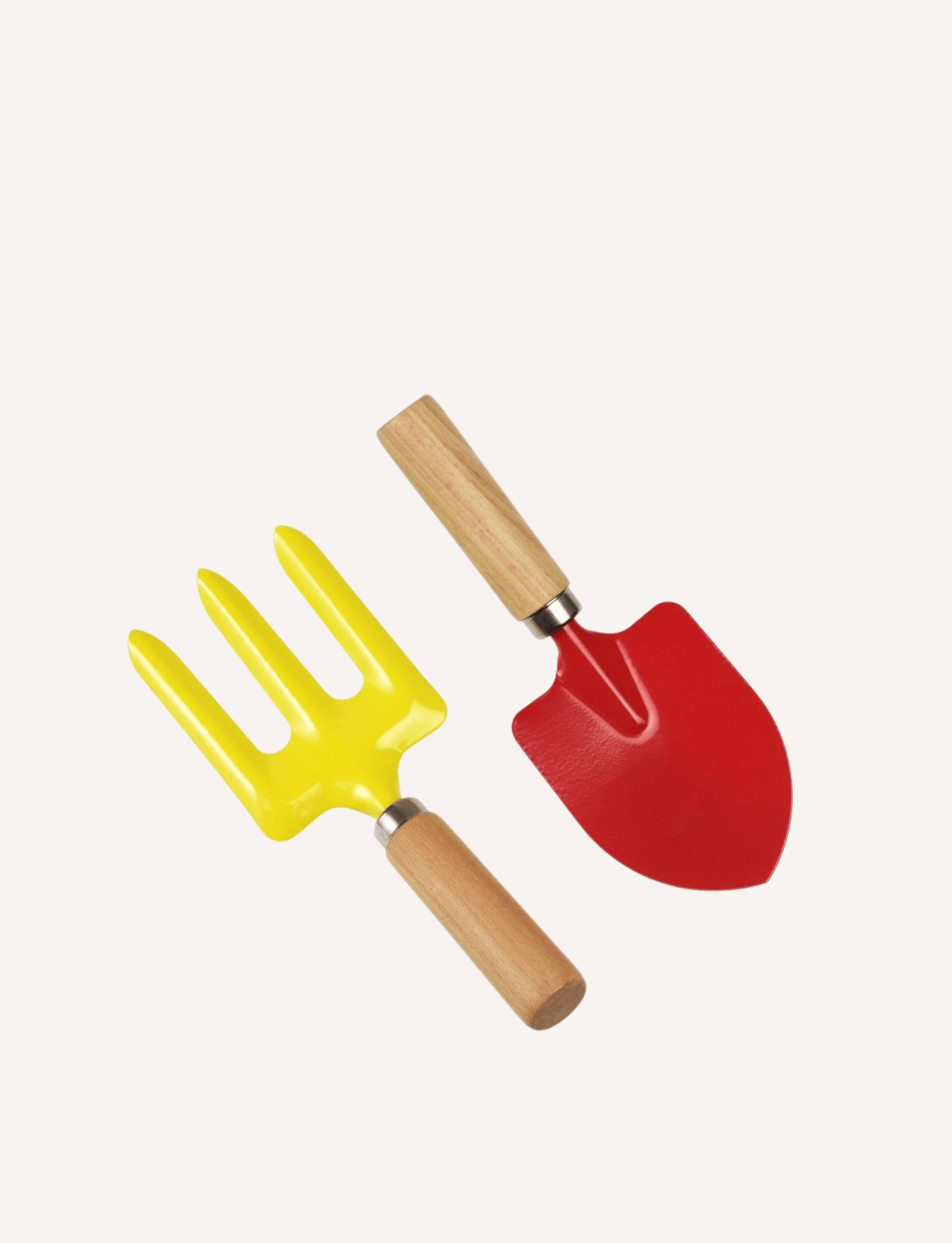 A small Ladybird Garden Fork with a yellow head and a wooden handle lies next to a red Ladybird Garden Spade, both featuring matching wooden handles. These vibrant tools are part of Rex London's charming kids gardening set, arranged against a plain white background—perfect for young gardeners.