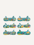 The Submarine Bath Book by Janod is a set of six identical toy submarines, each showcasing vibrant, cartoon-style sea creatures and underwater scenery. The light blue submarines are adorned with designs of fish, octopuses, and various other marine life. These playful toys come neatly arranged in two rows of three.