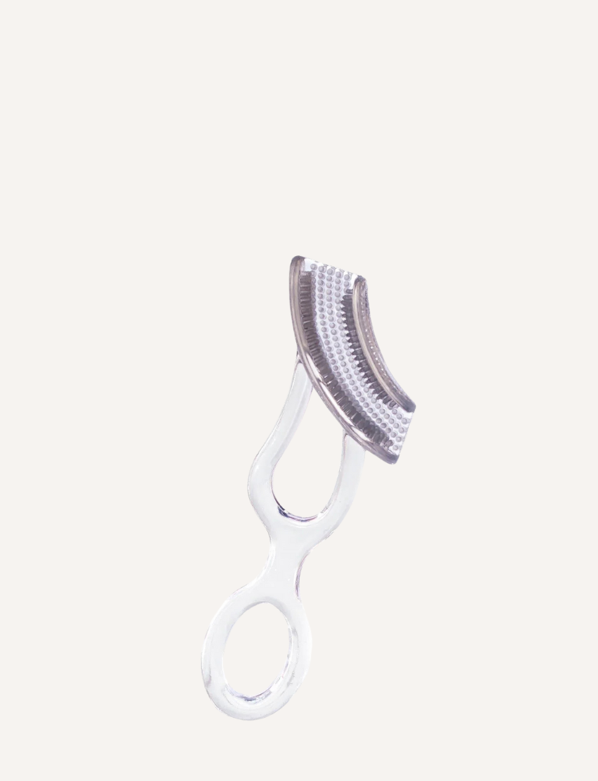 A Jack N' Jill brand Silicone Finger Tooth and Gum Brush - Stage 3 for children aged 2-5 years, packaged in a brown box with a clear window displaying the brush inside.