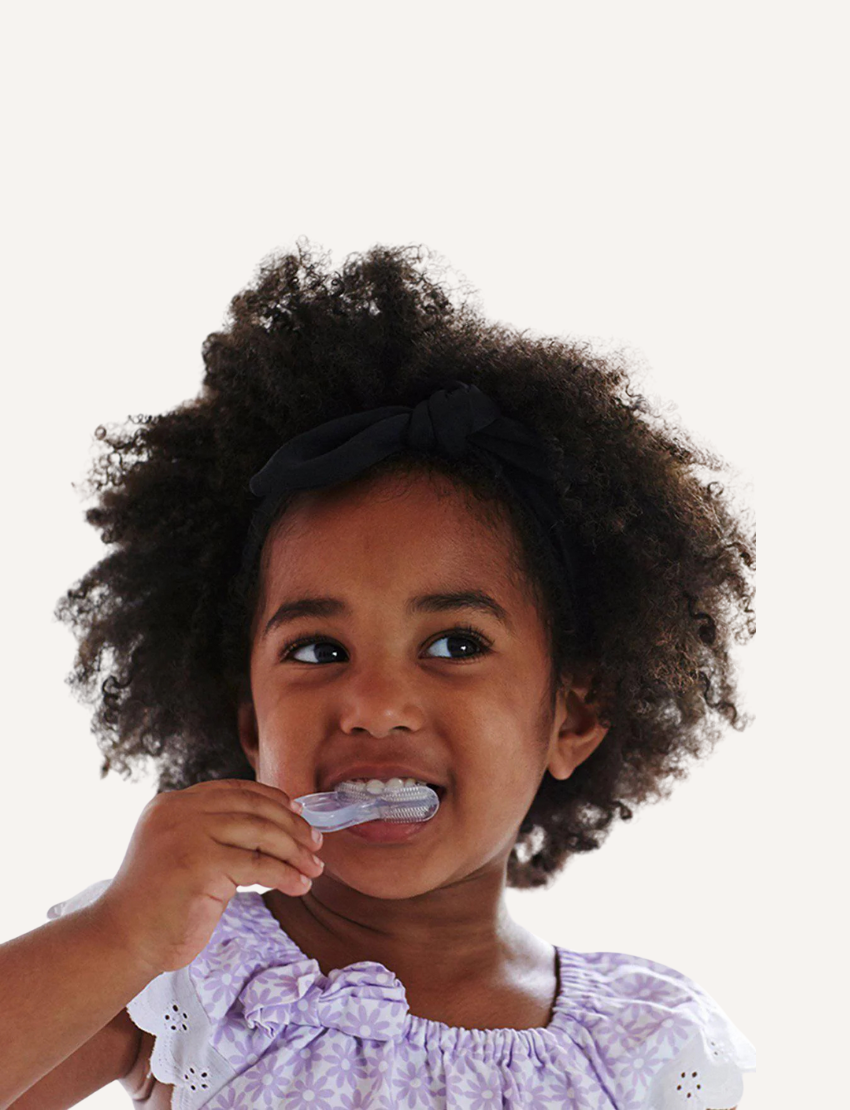 A Jack N' Jill brand Silicone Finger Tooth and Gum Brush - Stage 3 for children aged 2-5 years, packaged in a brown box with a clear window displaying the brush inside.