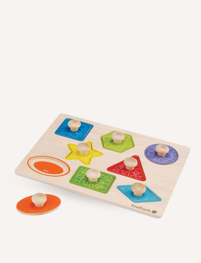 The EverEarth Shape Knob Puzzle is a delightful toddler toy featuring seven differently shaped and colored pieces with knobs: an oval, star, square, triangle, diamond, circle, and hexagon. One oval piece is playfully removed and placed outside the board.