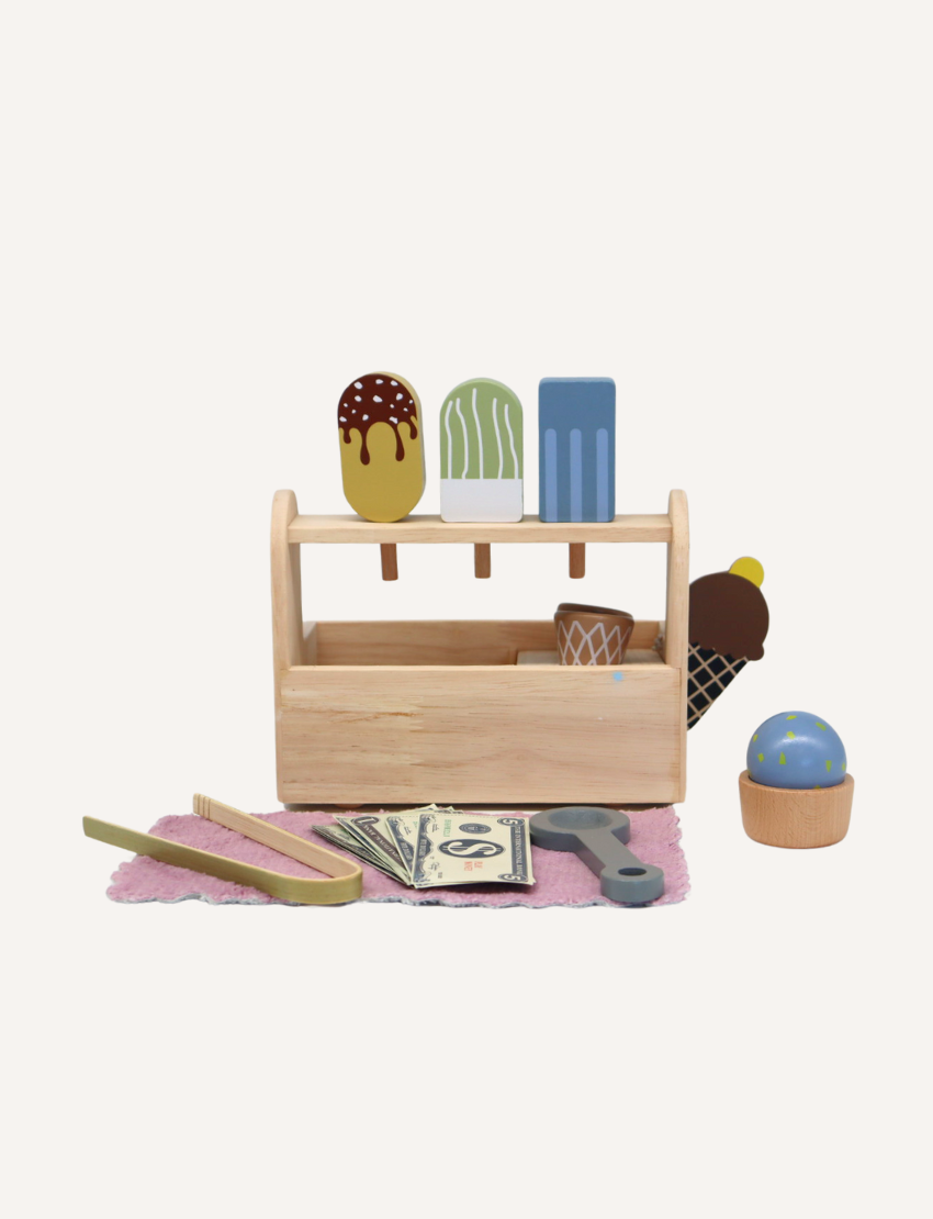 The Play Way Ice Cream Parlour with Menu, a wooden playset featuring cones, popsicles, money, and tongs for imaginative play.