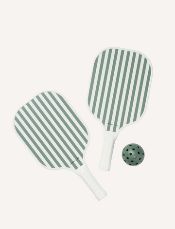 Two paddles from the Sunnylife Pickleball Set, featuring green and white stripes, are placed side by side. A green pickleball with holes is situated nearby on a simple white background.