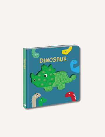 The "Dinosaur Bubble Pops Book" by Lake Press is a children's dinosaur book featuring a blue cover with an attached green dinosaur-shaped pop-it toy, providing visual, tactile, and auditory play. The cover also includes illustrations of other colorful dinosaurs framing the border.