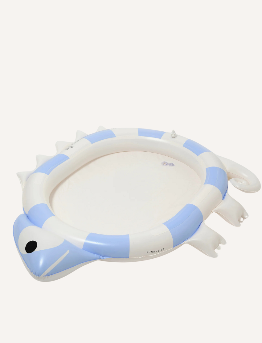 An inflatable turtle sprinkler mat with blue and white stripes, designed for outdoor play.