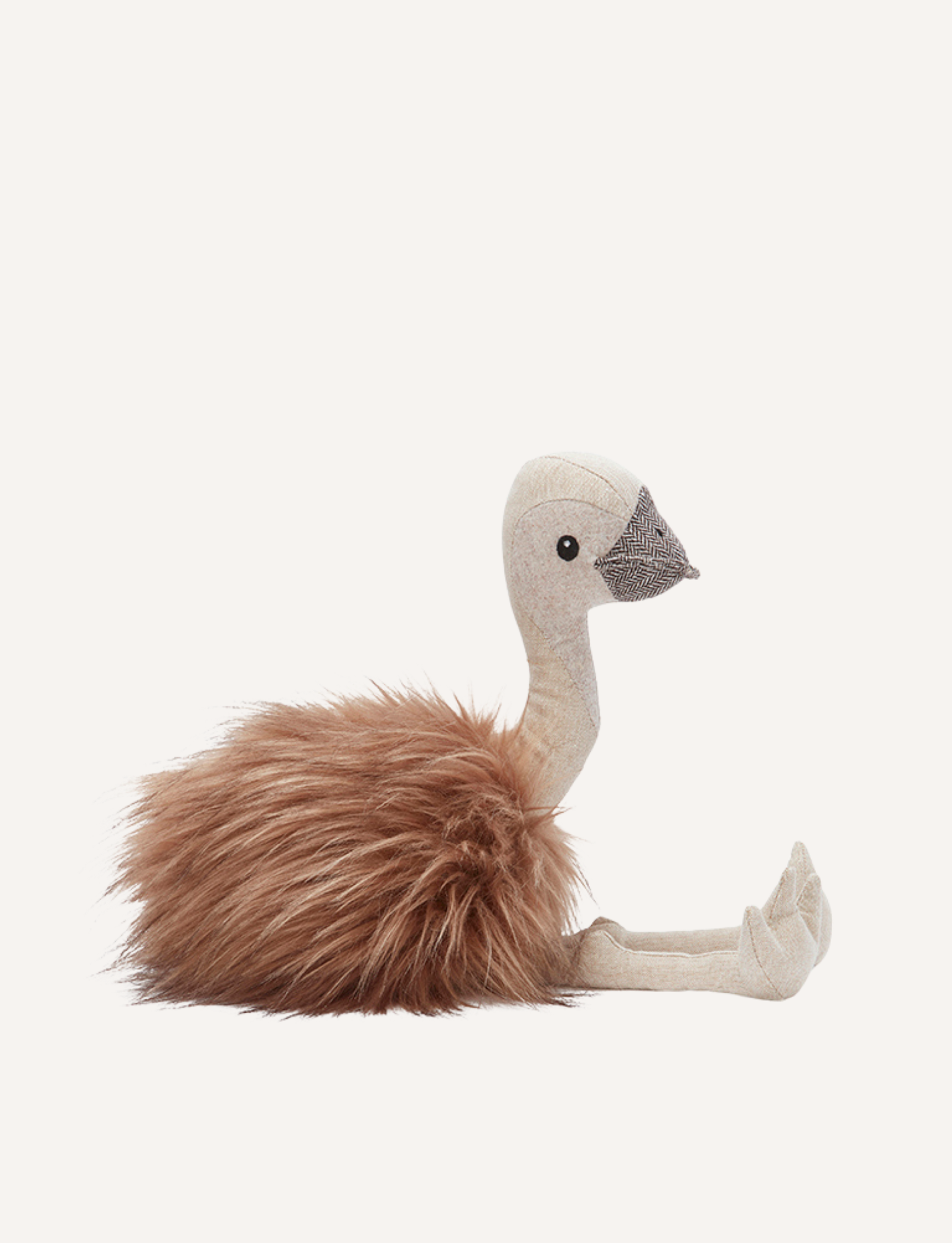 A plush ostrich toy named Eddie the Emu from Nana Hutchy features a beige body and head, dark round eyes, and fluffy brown feathers. The soft toy is posed sitting with its legs stretched out in front, ready for the Australian Animal Olympics as Eddie's charming companion.