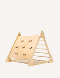 The Artiwood Pikler Slide and Climber Set is a wooden climbing structure for children featuring an A-frame design. One side has horizontal climbing steps, while the other side incorporates a net for climbing. The wood is lightly finished to accentuate its natural grain.