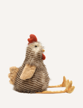 Rupert the Rooster, a plush toy from Nana Hutchy, sits against a plain background. The toy features brown and white striped fur, an orange beak and comb, and long yellow legs with three toes each extending outward.