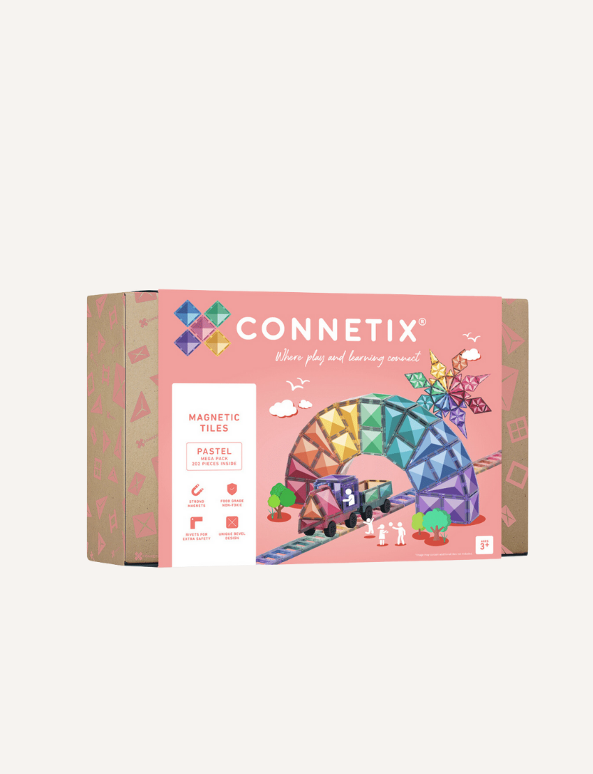 A Connetix Pastel Mega Pack 202-Piece set in a pink box, showcasing a vibrant construction of geometric shapes combined with a toy train and children figures. The packaging features playful illustrations and labels that specify the product is suitable for ages 3 and up.