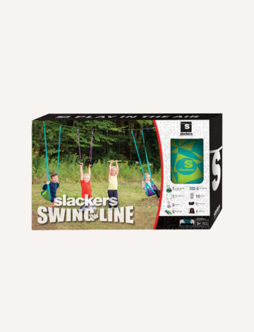 Introducing the Slackers Swingline: a versatile setup featuring two swings in vibrant green and purple, rings, and a trapeze bar, all connected to a slackline. The set comes complete with a sturdy box, an instruction manual for easy assembly, and a convenient backpack for effortless storage.