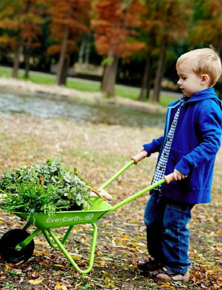 The EverEarth Wheel Barrow in a bright green design with a black wheel and wooden handles features the logo on a white background. A delightful addition to any garden set, it invites children to explore nature through outdoor play.