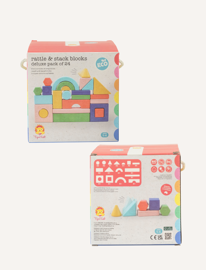 The "Rattle & Stack Blocks - Deluxe Pack of 24" from Tiger Tribe includes a vibrant collection of blocks in different shapes and sizes. The packaging is eco-friendly, designed for children aged 1-4, and features a convenient handle for easy transportation.