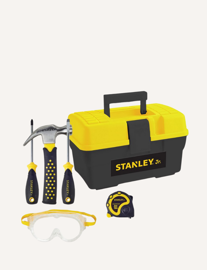 A toolbox featuring a yellow and black design labeled "Stanley" comes with a 5-piece tool set consisting of a hammer, screwdriver, measuring tape, and safety goggles. The tools feature black handles accented with yellow.