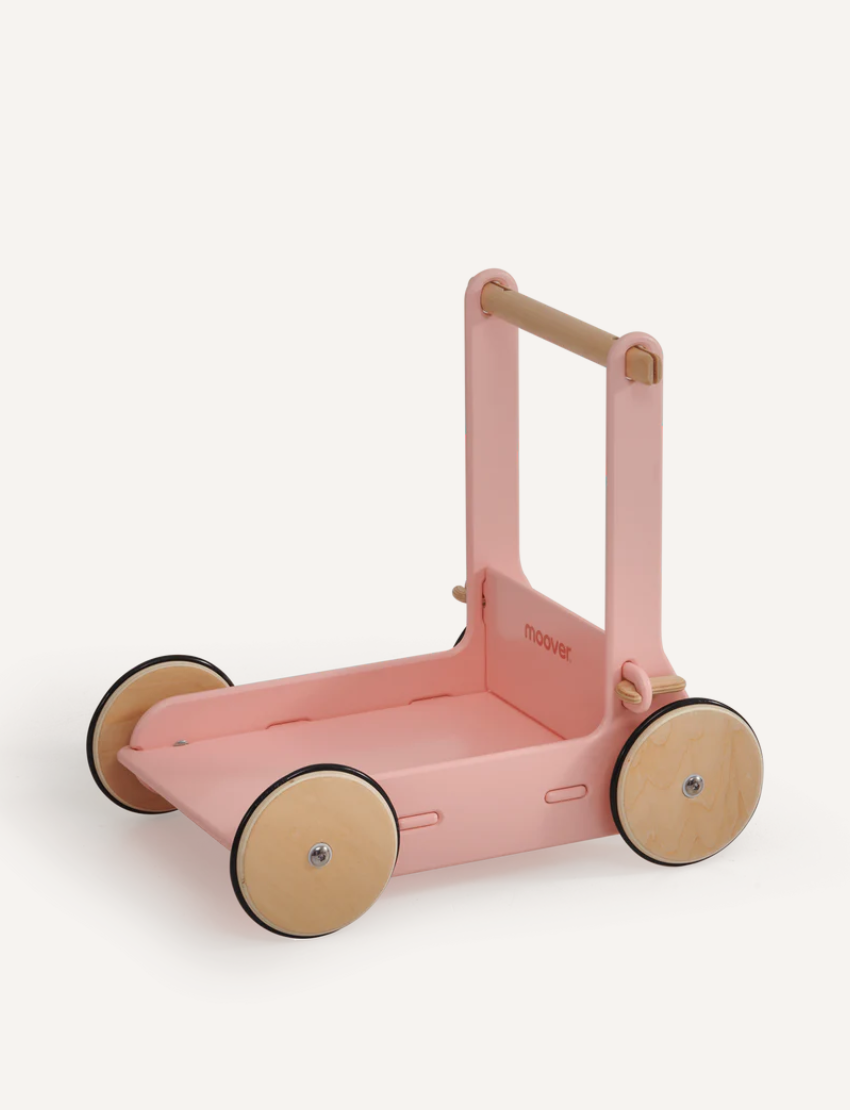 The Moover Toys Classic Baby Walker, in light green, is a perfect wooden mobility toy for a child's development. Featuring four natural wood wheels and a sturdy handle, its elegant brand name enhances its simple design, promising both fun and growth for your little one.