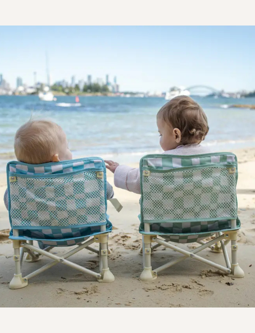 The IZIMINI Baby Chair features a lightweight, portable design with a foldable metal base and floral fabric in orange, blue, and purple, plus a beige plastic tray.