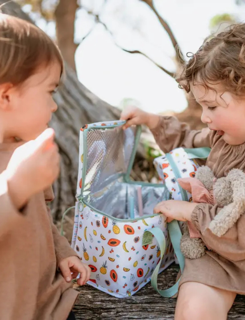 The IZIMINI Lunch Bag is a rectangular, eco-friendly option with yellow and white vertical stripes. This BPA-free design includes a top zipper and white handles for easy carrying.