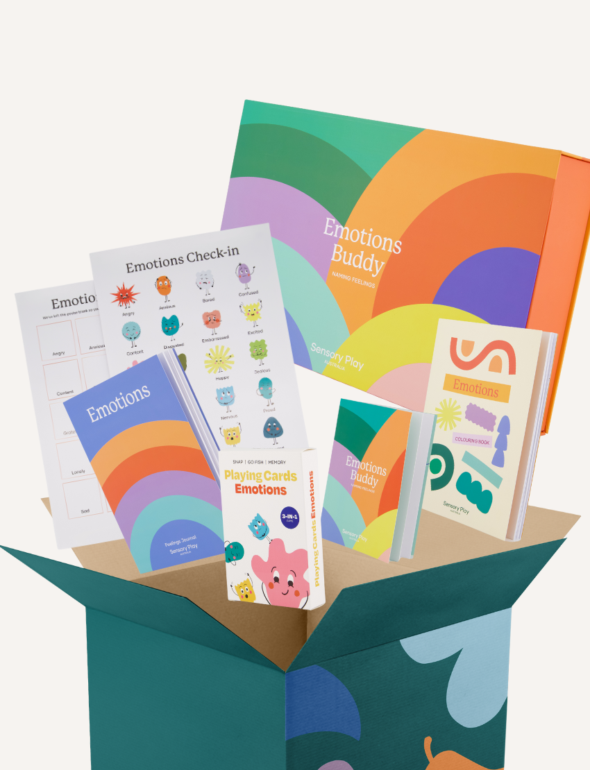 Sensory Play Australia Emotions Buddy Naming Feelings Set: an open box revealing books, cards, and posters for emotional learning.