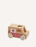 The Moover Mini Emergency Cars are simple wooden ambulances with white wheels, a red cross on the side, and 