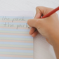 The Therapy At Home Handwriting in Practice Program includes a green and blue box with notebooks, pens, sticky notes, stickers, a pencil sharpener, planner sheets, a black carrying case, and a handwriting workbook for effective practice.