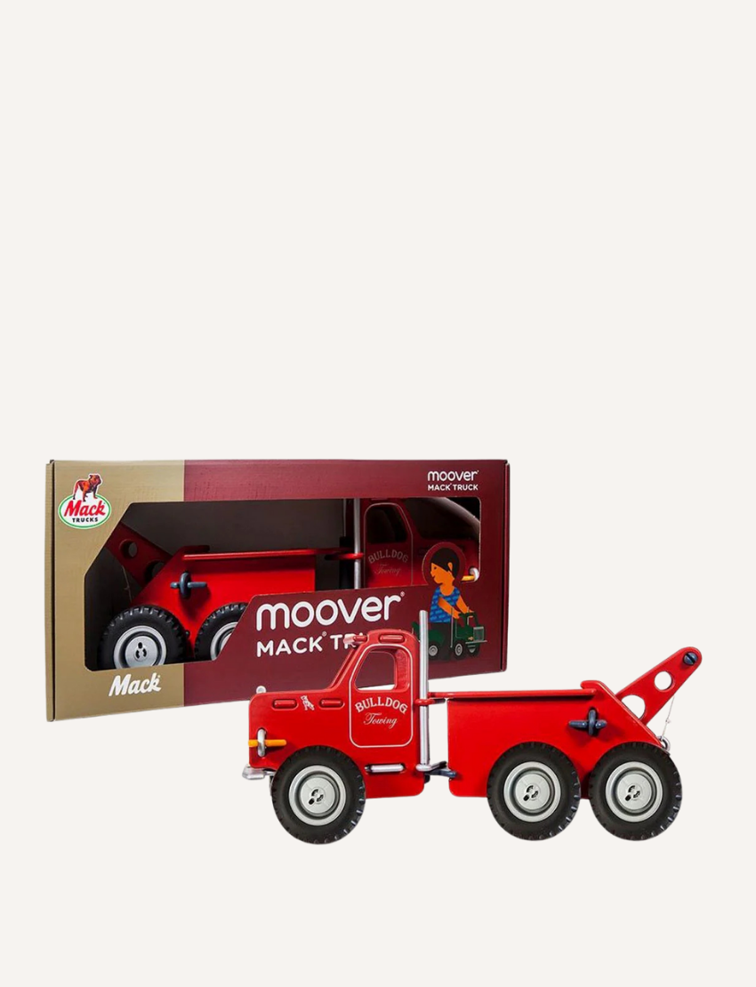 The Moover Mack Ride On Truck is a green toy tow truck with six wheels, featuring a detachable crane. It includes white accents on the wheels, headlights, and grill. "MACK" is boldly displayed on the side door, all set against a plain white background.