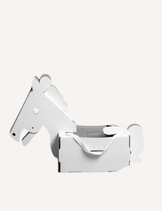 The Family Les Petite Artistes Imagination Bundle by Les Petite Artistes includes a cardboard playhouse with a front door and scalloped roof, complemented by a cardboard airplane and unicorn head for imaginative fun. These fold-and-flap designs inspire creativity without needing paint or intricate details.