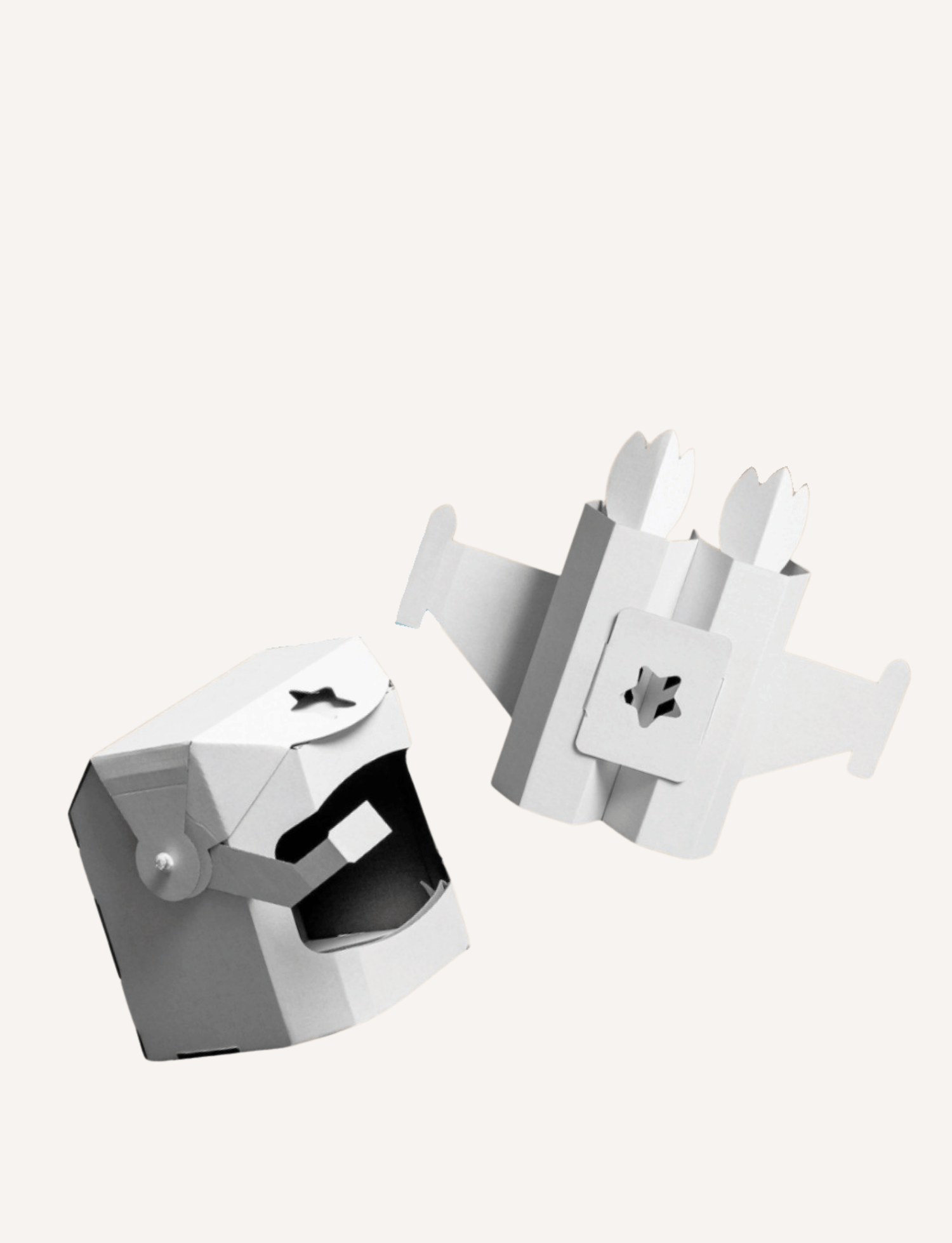 White cardboard jetpack and space helmet set for imaginative play.