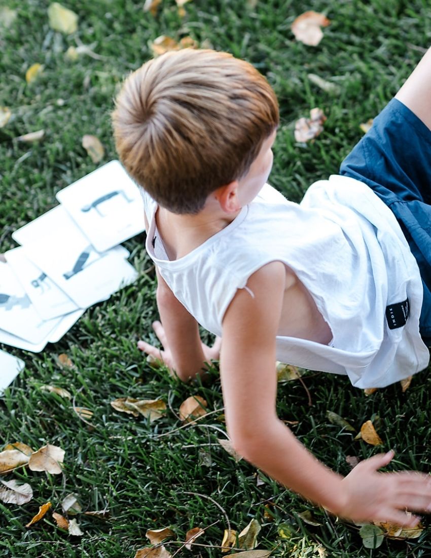 A "Core Strength Cards Set in Box" with a purple cover is shown. Accompanying the cards is an informational leaflet from "Sensory Play Australia," which provides details about the benefits of the kit and an invitation to start playing.