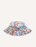 The IZIMINI Cotton Baby Hat is a vibrant bucket hat with a floral print of pink, orange, blue, and green leaves on white. Perfect for outdoor adventures with its wide brim and rounded top, it offers stylish sun protection.