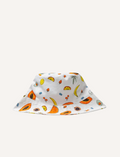 The IZIMINI Cotton Baby Hat is a vibrant bucket hat with a floral print of pink, orange, blue, and green leaves on white. Perfect for outdoor adventures with its wide brim and rounded top, it offers stylish sun protection.