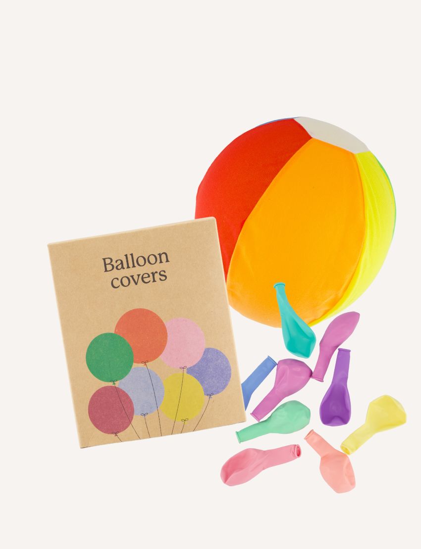 A set of colorful balloon covers by Sensory Play Australia, featuring an inflated beach ball, several deflated balloons in various colors, and a cardboard box labeled "Balloon Covers" with balloon illustrations.