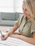 The Creative Handwriting Program by Therapy At Home includes an art pad, two pencils, a black case, crayons, and abstract booklets—ideal for supporting letter formation and fine motor skills.