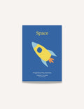 A colorful cardboard box from The Play Way contains a Space Kit, perfect for engaging in space-themed activities. Inside, assembled cardboard pieces form a rocket, a small spaceship, and an astronaut helmet. A booklet titled 